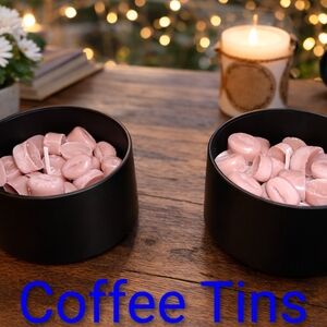 Elegant Black Candle Holders with Pink Wax Melts